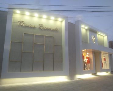 Fachada em ACM, letras em latão polido e iluminação em LEDS